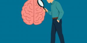 Person examining a large brain illustration with a magnifying glass, symbolizing the exploration of mental health and behavioral recovery.